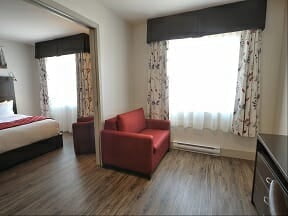 Chambre supérieure incluant 2 lits Queen et petit salon